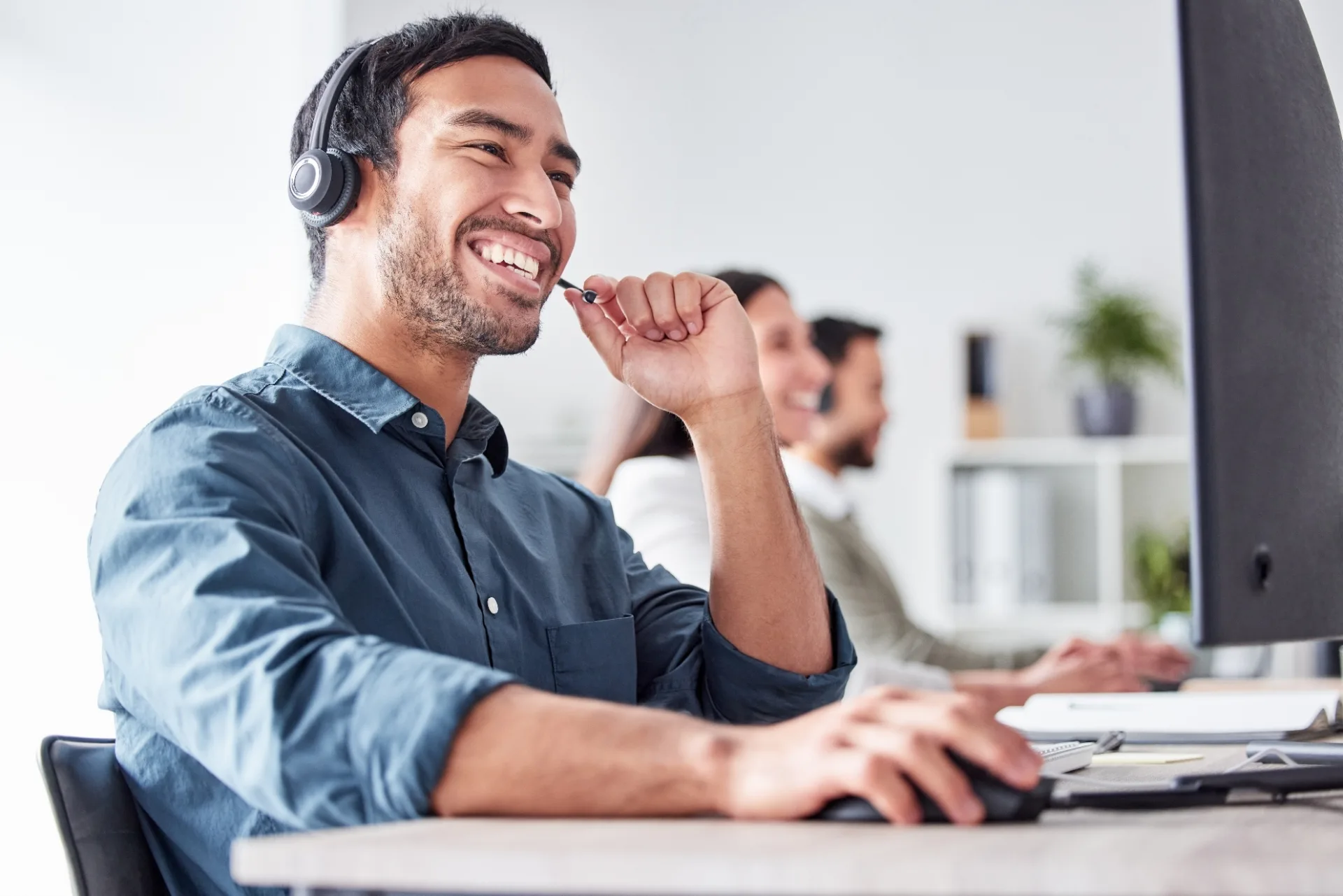 An insurance company employee taking a call
