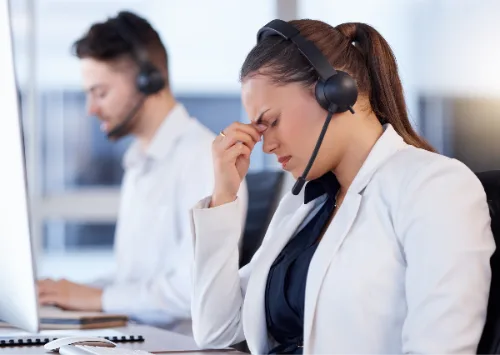 A woman sitting at her desk on a video call